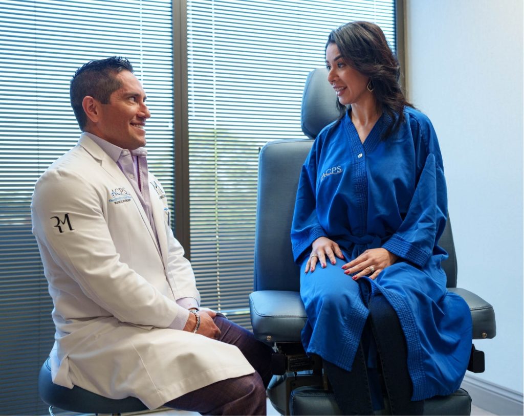 Dr. Rolando Morales with patient