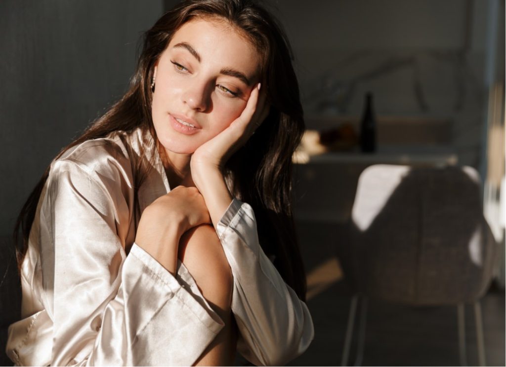 Model wearing silk robe