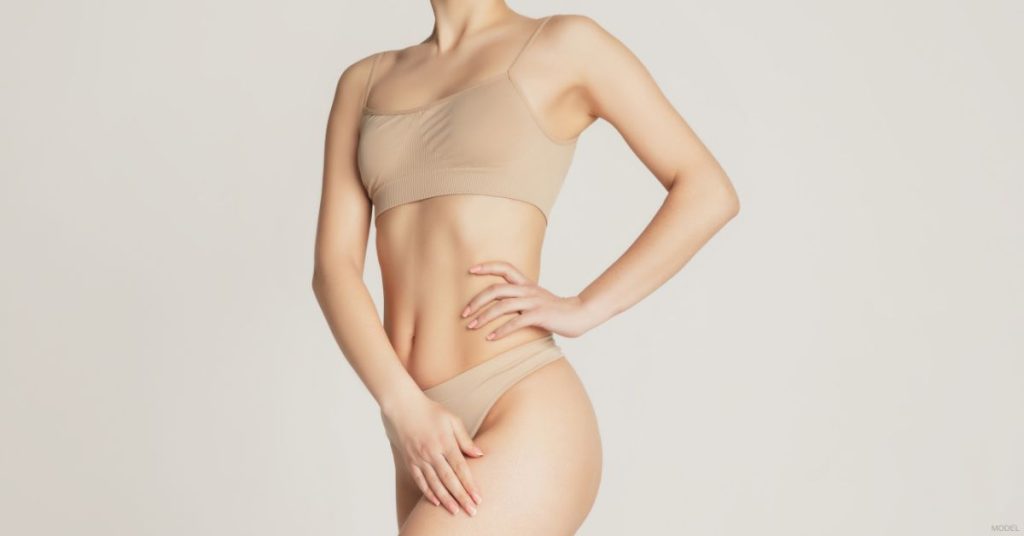 A woman in a tan bikini top and underwear. (Model)